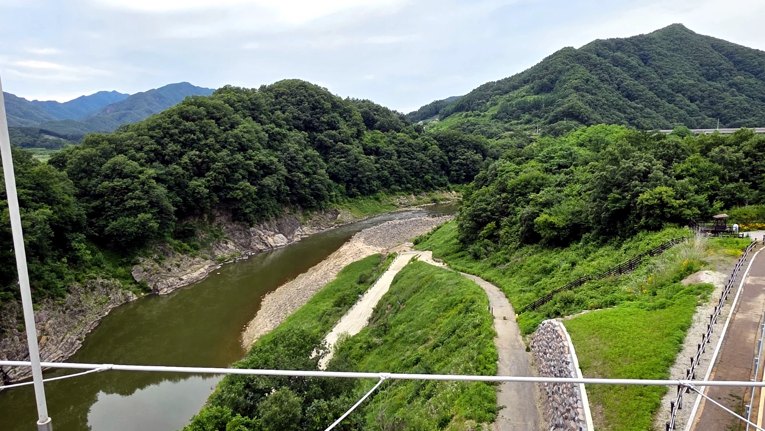 Hantangang Sky Bridge overlooks the fast Hantan River winding through the gorge.