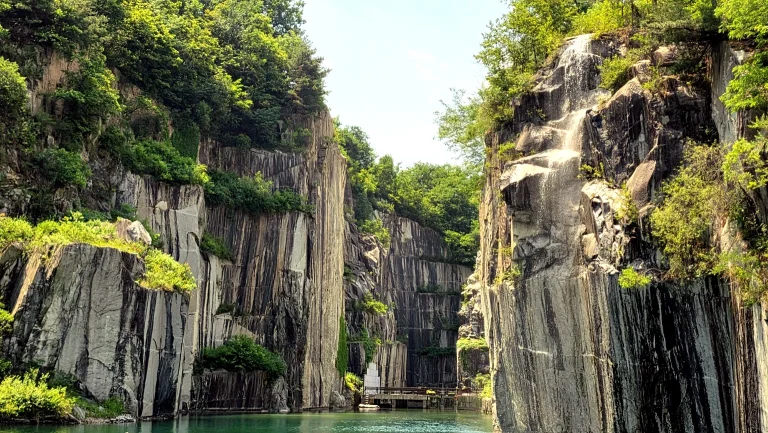 Pocheon Art Valley emerald quarry lake surrounded by granite cliffs
