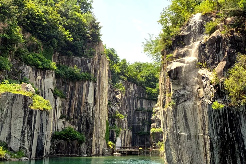 Pocheon Art Valley emerald quarry lake surrounded by granite cliffs